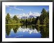 Snow-Capped Teton Range Reflected In Snake River, Wyoming, Usa by Mark Hamblin Limited Edition Print