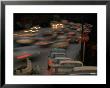Line Of Cars At Stop Sign Waiting To Enter Solid Wall Of Racing Commuters On Pasadena Freeway by Ralph Crane Limited Edition Print