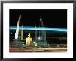 Moving Traffic At Democracy Monument, Bangkok, Thailand by Ryan Fox Limited Edition Print