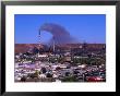 Smoke Billowing From A Smelter Stack With Mt. Isa In The Foreground, Australia by Ross Barnett Limited Edition Pricing Art Print