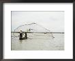 Fishermen Cast Out A Net Into The Mekong River by W. E. Garrett Limited Edition Print