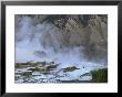A View Of Terraced Mammoth Hot Springs With A Mountain Backdrop by Norbert Rosing Limited Edition Pricing Art Print