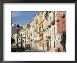 House Fronts And Laundry, Trapani, Sicily, Italy by Ken Gillham Limited Edition Print