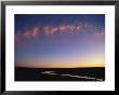 Clouds Form Interesting Patterns In The Evening Sky by Paul Nicklen Limited Edition Print