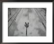 Security Cameras Overlook The Platform At The Osterport Rail Station by Cotton Coulson Limited Edition Print
