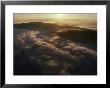 Aerial View Of A Bridge Over The Foggy Columbia River by Cotton Coulson Limited Edition Print