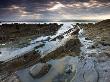 Rockpools And Ledges Beneath Cloudy Sky, Sandymouth Beach, Cornwall, England by Adam Burton Limited Edition Print