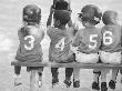 Four Young Baseball Players Wearing Sequential Numbers by Images Monsoon Limited Edition Pricing Art Print