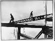 Steel Workers Walking A Girder And Derrick Boom During Delaware Memorial Bridge Construction by Peter Stackpole Limited Edition Print