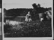 Sweet Little Girl Playing By A Pond In The Backyard Of Lance's House; She Is His Niece by George B. Brainerd Limited Edition Print