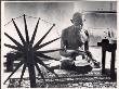 Indian Leader Mohandas Gandhi Reading As He Sits Cross-Legged On Floor by Margaret Bourke-White Limited Edition Print