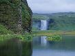 A Waterfall Skogafoss Reflecting In Water, Iceland by Johannes Long Limited Edition Pricing Art Print