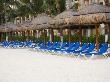 Row Of Lounging Chairs, Playa De Carmen, Quintana Roo, Mexico by Julie Eggers Limited Edition Print