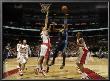 Denver Nuggets V Toronto Raptors: Nen� And Andrea Bargnani by Ron Turenne Limited Edition Print
