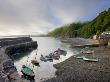 Fishing Boats Moored In The Harbour At Clovelly, Devon, England by Adam Burton Limited Edition Pricing Art Print