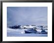 Abandoned Boat On Frozen Body Of Water, Ak by Jim Oltersdorf Limited Edition Print