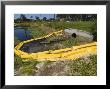 Floating Yellow Barriers In Borrow Pit Pond Control Runoff From Construction Site, Sarasota, Fl by David M. Dennis Limited Edition Print