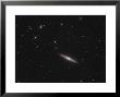 A Close Up Of Ngc 4013, An Edge-On Unbarred Spiral Galaxy In The Constellation Ursa Major by Stocktrek Images Limited Edition Print