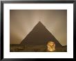 Cheops Pyramid And King Tut Image Superimposed On Sphinx At Night, Cairo by Holger Leue Limited Edition Print