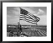 Soldiers Raising American Flag At Atsugi Airbase As First American Occupation Forces Arrive by Carl Mydans Limited Edition Print