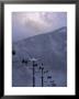 Chair Lift Filled With Skiers And Snowboarders, Washington State, Usa by Aaron Mccoy Limited Edition Print