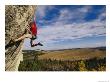 Young Man Climbing The Rock Feature Known As Bobcat Logic by Bobby Model Limited Edition Print