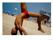 Young Man Doing Capoiera On Beach, Tel Aviv, Israel by Stephane Victor Limited Edition Print