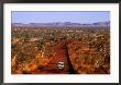 Car On Outback Road, Karijini National Park, Australia by Oliver Strewe Limited Edition Print