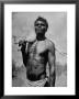 Australian Aborigine Holding A Freshly Killed Animal Used As A Food Source by Fritz Goro Limited Edition Print