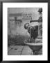 Young Boy Getting A Drink From Fountain In Trieste Region by Nat Farbman Limited Edition Print