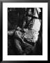 Helicopter Chief James C. Farley Working Jammed Machine As Pilot Lt. James Magel Dying Beside Him by Larry Burrows Limited Edition Print