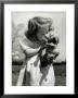 Christina Goldsmith Kissing A Weimaraner Puppy From Her Father's Stock Of Weimaraner Hunting Dogs by Bernard Hoffman Limited Edition Print