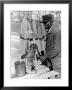 Old African American Sharecropper Dave Alexander Using Water Pump To Draw Water by Alfred Eisenstaedt Limited Edition Print