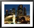 Merlion Fountain With Statue Of Half Lion And Fish, With City Buildings Beyond, Southeast Asia by Richard Nebesky Limited Edition Print
