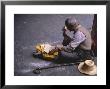 Tibetan Buddhist Pilgrim Reading Texts And Holding Prayer Wheel, Lhasa, China by Alison Wright Limited Edition Print