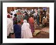 Ethiopian Orthodox Priest Leads Procession Around Church Of Bet Maryam During Fasika by Andrew Burke Limited Edition Print