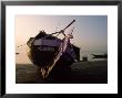 Beached Fishing Boat At Twilight by James L. Stanfield Limited Edition Pricing Art Print