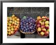 Three Baskets Of Colorful Fruit At A Market In Siena, Tuscany, Italy by Todd Gipstein Limited Edition Print