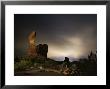 Balanced Rock Basks In The Glow Of The Town Of Moab by Jim Richardson Limited Edition Print