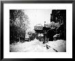 Snow Covered Exterior Of Grand Opera House At Elm Place And Fulton St. During Blizzard Of 1888 by Wallace G. Levison Limited Edition Print