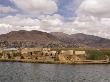 Floating Artificial Islands Made Of Reeds, Islas De Los Uros, Lake Titicaca, Peru by Dennis Kirkland Limited Edition Print