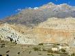 Small Village With Terraced Fields In Mustang, Nepal by Stephen Sharnoff Limited Edition Print