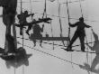 Shadows And Silhouettes Of Shipyard Workers Suspended In Rope Rigging by J. Kauffmann Limited Edition Pricing Art Print