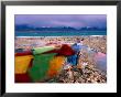 Prayer Flags On Shore Of Namtso Lake, Damxung, China by Anthony Plummer Limited Edition Print
