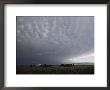 Storm Clouds Over A Farm by Annie Griffiths Belt Limited Edition Print
