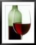 Red Wine Glass With Half-Full Wine Bottle In Background by Joerg Lehmann Limited Edition Pricing Art Print