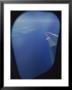 A View Out Of An Airplane Window Over Water And Nearby Islands by Roy Gumpel Limited Edition Pricing Art Print