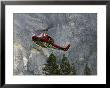 Rescue Helicopter In Front Of One Of Yosemite Valley's Big Walls by Brent Winebrenner Limited Edition Print