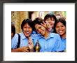 Schoolgirls At Wat Pho Celebrating Buddha Day, Ratanakosin, Bangkok, Thailand by Ray Laskowitz Limited Edition Print