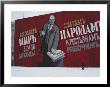 Man Passing By Giant Poster Of Lenin, St. Petersburg, Soviet Union by Brimberg & Coulson Limited Edition Print